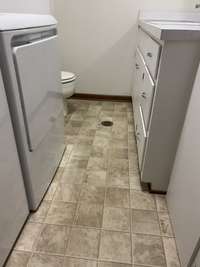 Easy to clean up Utility room with a drain