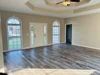 Double tray high ceiling in this large living room.