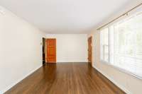 Sunshine approved ☀️—beautiful windows light up the family room.