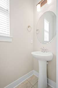 Living/kitchen area half bath.