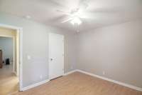 This bedroom has a regular sized closet. All bedrooms have ceiling fans.