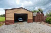 Your car will appreciate the garage. There is enough space for your car and more! Note the storage shed with electric that also conveys with the home.