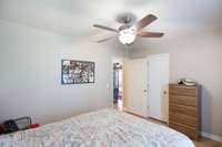 This guest bedroom has a walk-in closet, as well.