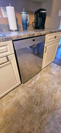 Stainless dishwasher is new.