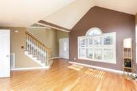 Vaulted ceilings and spacious foyers invites you in.