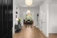 What a foyer! So wide and inviting. Gorgeous line of site to back yard