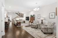 This space is set up as a comfortable nook but could easily be a dining area if you prefer to put a table and chairs there.