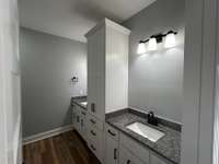Main Bath with double vanities and custom shelving