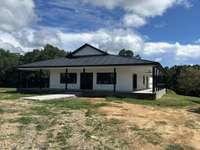 Front circle driveway in process of fresh graveling
