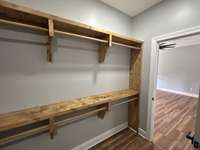 Main Bedroom Closet with access to Laundry Room also