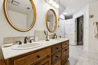 Oak cabinets, with high-quality fixtures and a large linen closet that has additional laundry hookups!