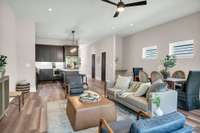 Open Kitchen, Living and Dining Area with Custom Desk Top/Bar area with Lots of Natural Light.