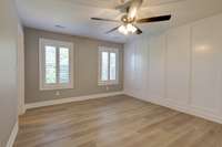 Master Bedroom offers a large walk in closet and in suite bathroom. Built in blackout shades and plantation shutters