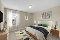 VIRTUAL STAGING in the first of three upstairs bedrooms. This one looks out toward the front of the home, is large, and has a nice sized closet in it.