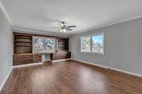 Another spacious bedroom or playroom on 2nd floor with great built-ins.