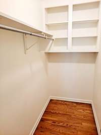 Huge walk-in closet in primary bedroom