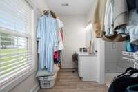 Large closet in primary bedroom with vanity - a dream!