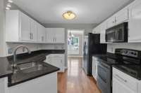 Fridge stays and you have a built-in microwave.