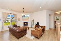 Large windows fill the room with natural light.