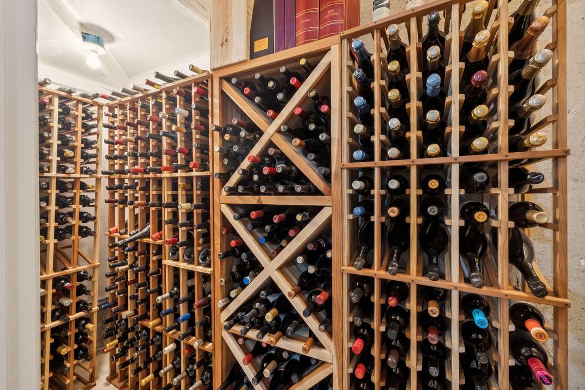 Enclosed wine cellar in the basement.