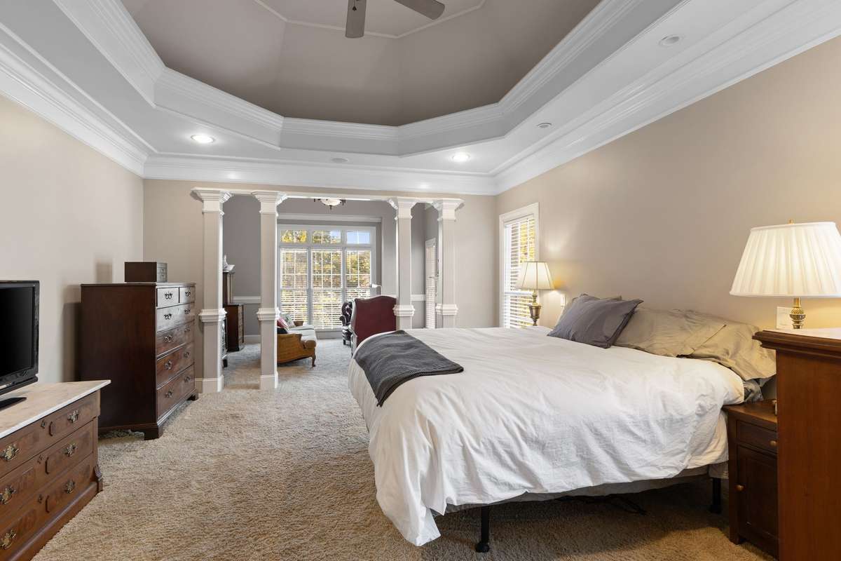 Primary Bedroom with a seating area overlooking the beautiful views.