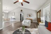 This Great Room has been virtually staged to provide options for furniture placemnent