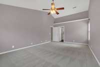 Spacious primary bedroom on second floor.