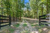 Step through the gate to discover a stunning adjacent 5-bedroom build site, ready for your vision.