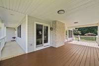 Enjoy the oversize side deck/wrap around porch.
