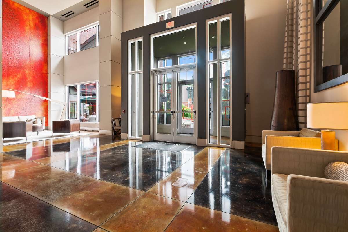 The striking lobby decor of The Icon makes a grand entrance for visitors with 24-hour concierge service. The Icon is the largest footprint of any condo building in Nashville.