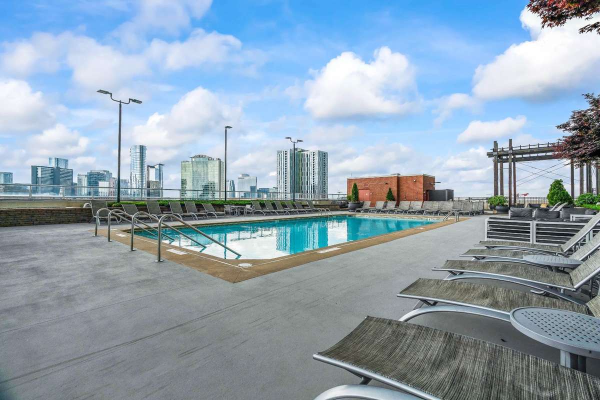 The main Skydeck Swimming Pool has an incredible view of downtown Nashville. It is one of two swimming pools at The Icon in the Gulch.