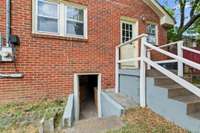 Full, unfinished basement with exterior access