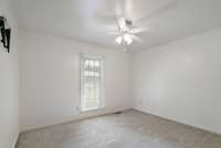 Spare Bedroom 3 with lots of natural light and walk in closet.