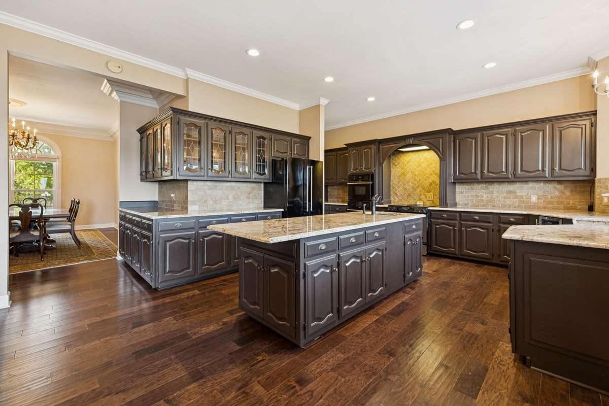 The kitchen was updated to perfection. Entertainers Paradise. Extensive cabinetry, large island and dbl ovens.