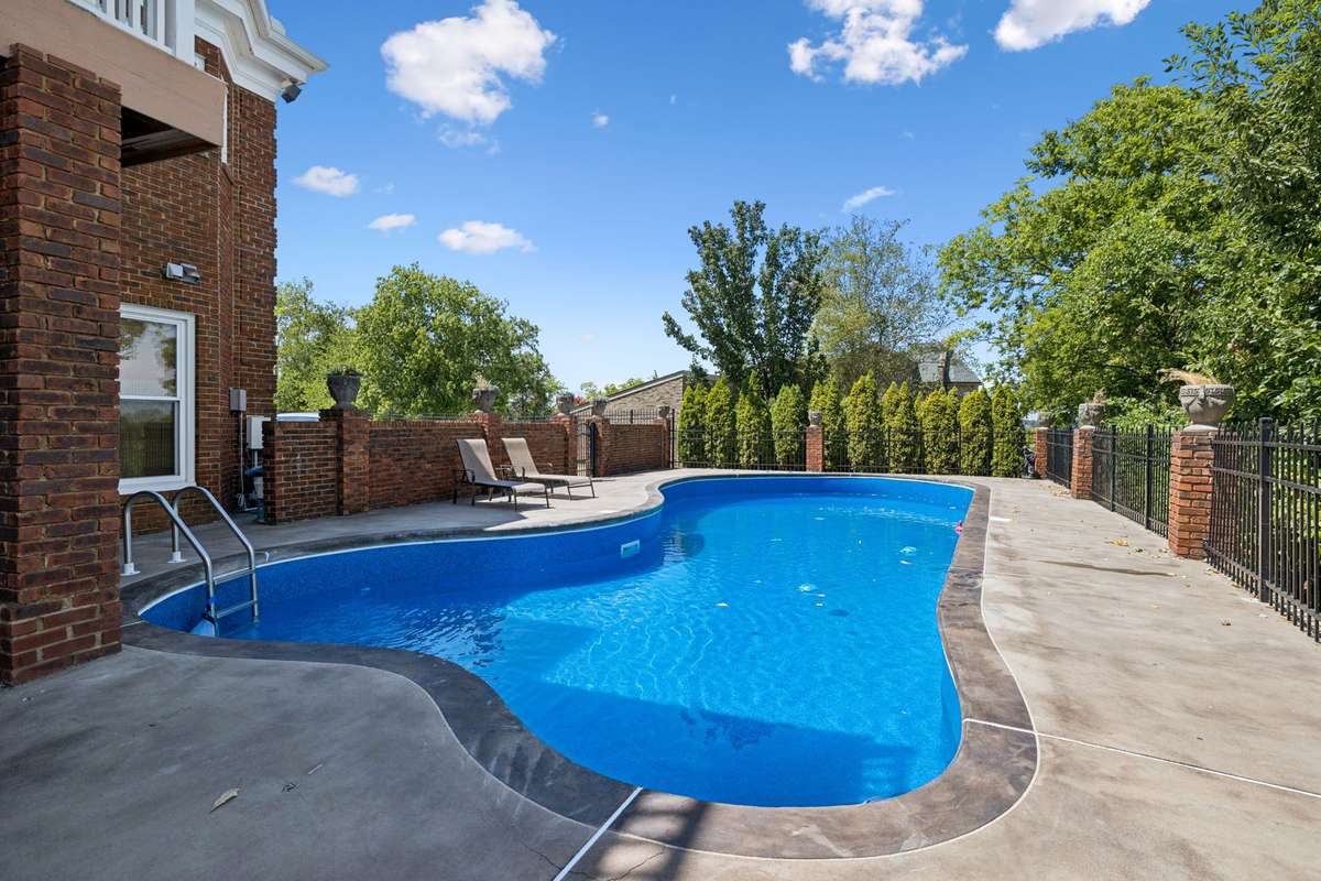Totally private pool, extensive landscaping, and large pool decking.