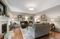 Great room features gas fireplace, beautiful hardwood flooring and space for those holiday gatherings,