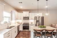 Sleek, stainless appliances complement the space perfectly.