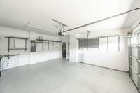 Notice the epoxy floors and added shelving! There is room to customize and add additional pieces to make it your own!