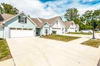 The community is tucked among trees and backs up to the lake, combining a private setting with a fun, inviting vibe.