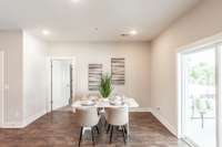 The dining area easily accommodates tables of various sizes and shapes to fit your needs.