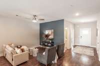 A bold accent wall adds a fun splash of color, making the living area feel modern and unique.