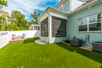 Low-maintenance turf keeps the yard looking lush and green all year long—no mowing required.