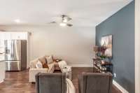 Durable and stylish floors run throughout the living area, adding warmth and easy maintenance.