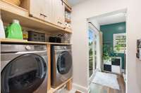 Laundry room w/ plenty of space and storage.