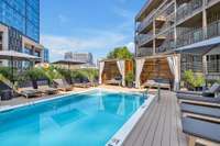 The pool area has four cabana sitting areas that are free of charge, and first come, first serve for guests.