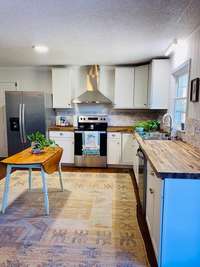 New Upper kitchen cabinets and vent recently installed