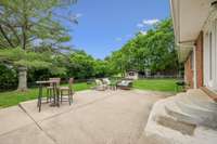 Back patio and fenced yard