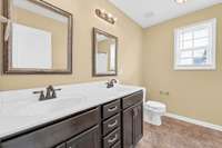 Primary bath features double vanities.