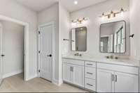 Owner's Bath with Linen Closet.
Photo is of actual Home.
