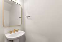 First Floor Powder Room.
Photo is of actual Home.